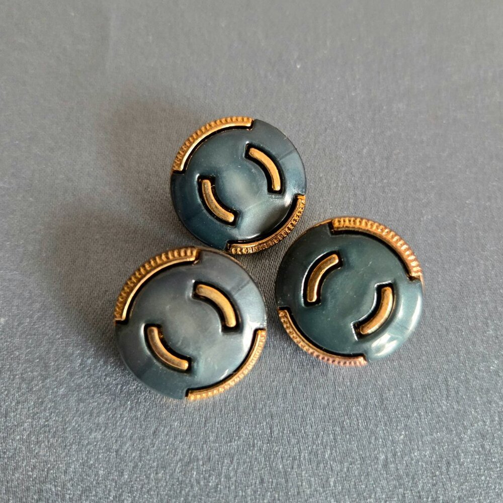 3 vintage blue buttons with gold details.